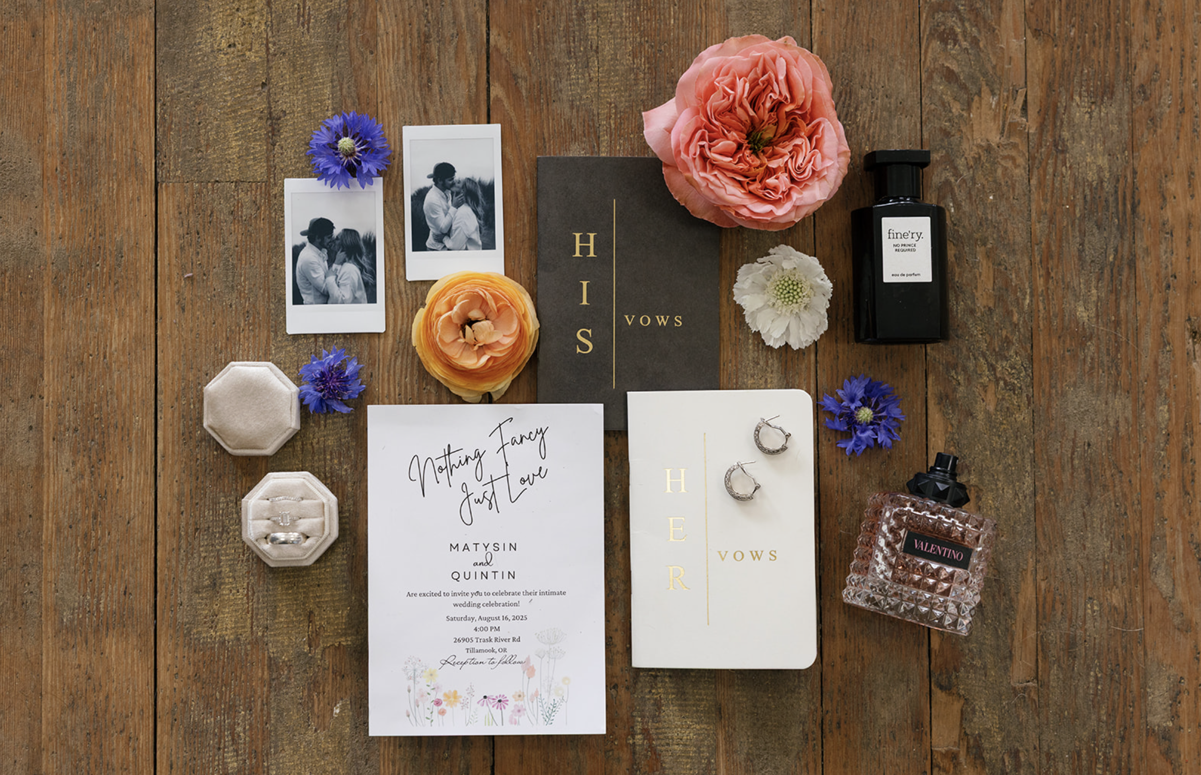 Flat lay of elegant wedding details including invitation suite, rings, bouquet flowers, and accessories, captured by San Antonio wedding photographer Angie Rich.
